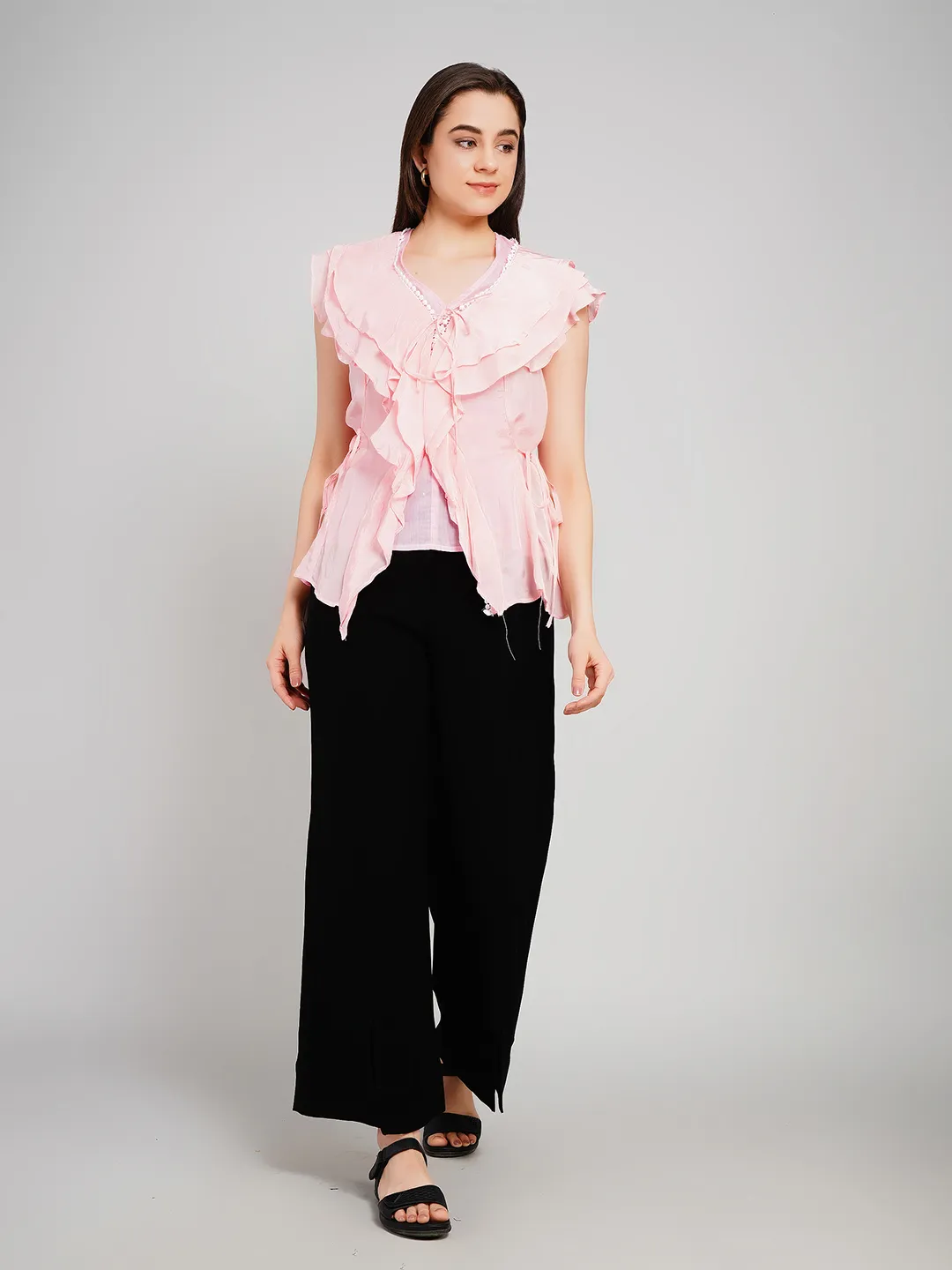 Women Pink Sleeveless Peplum Top with Draped Ruffles and Tie-Up Detail