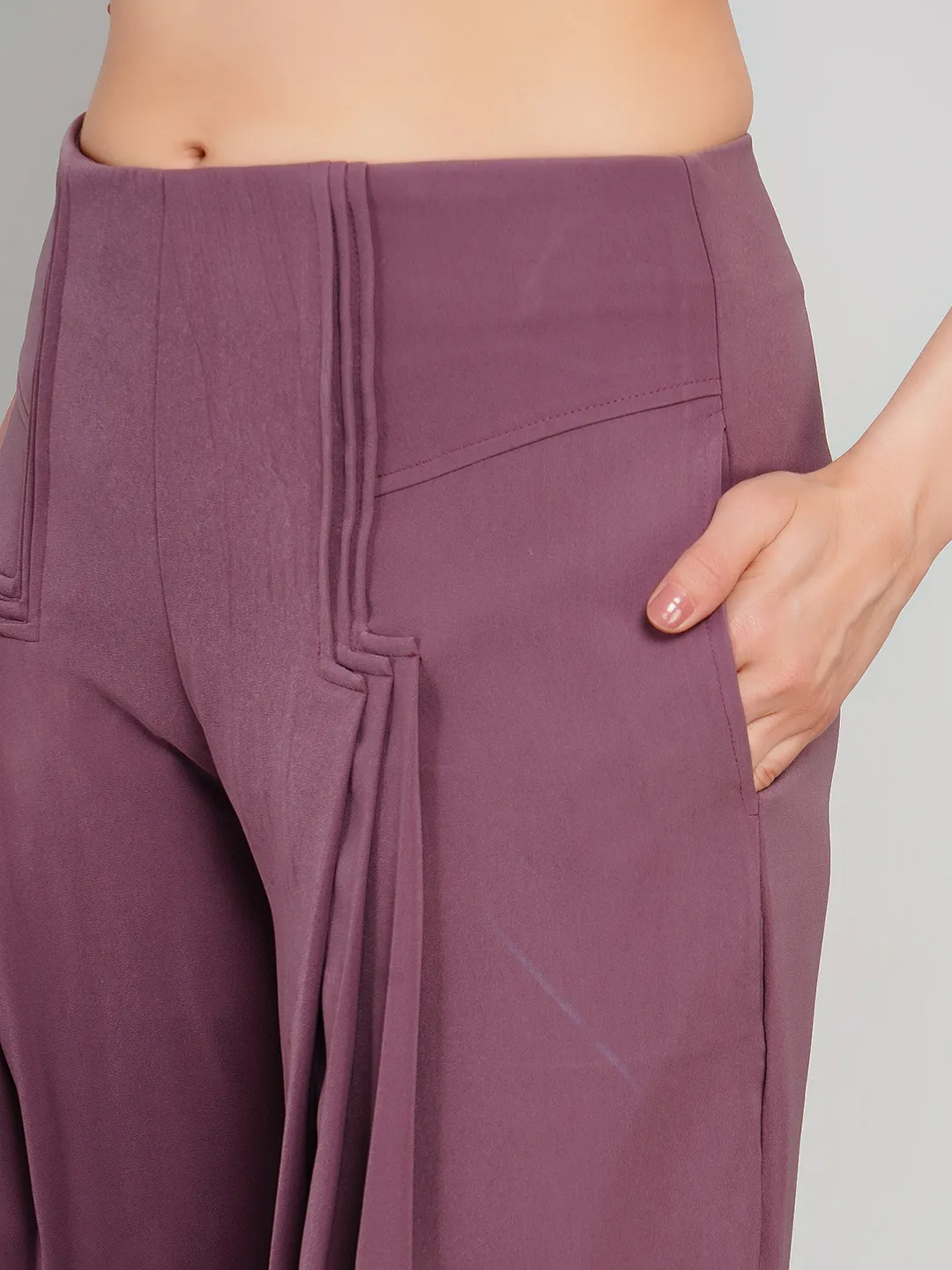 Women Plum Solid Pleated Palazzo Trousers with Structural Seams